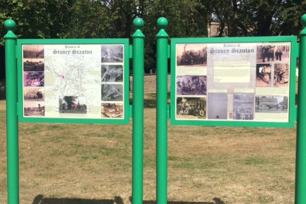 History boards on the green